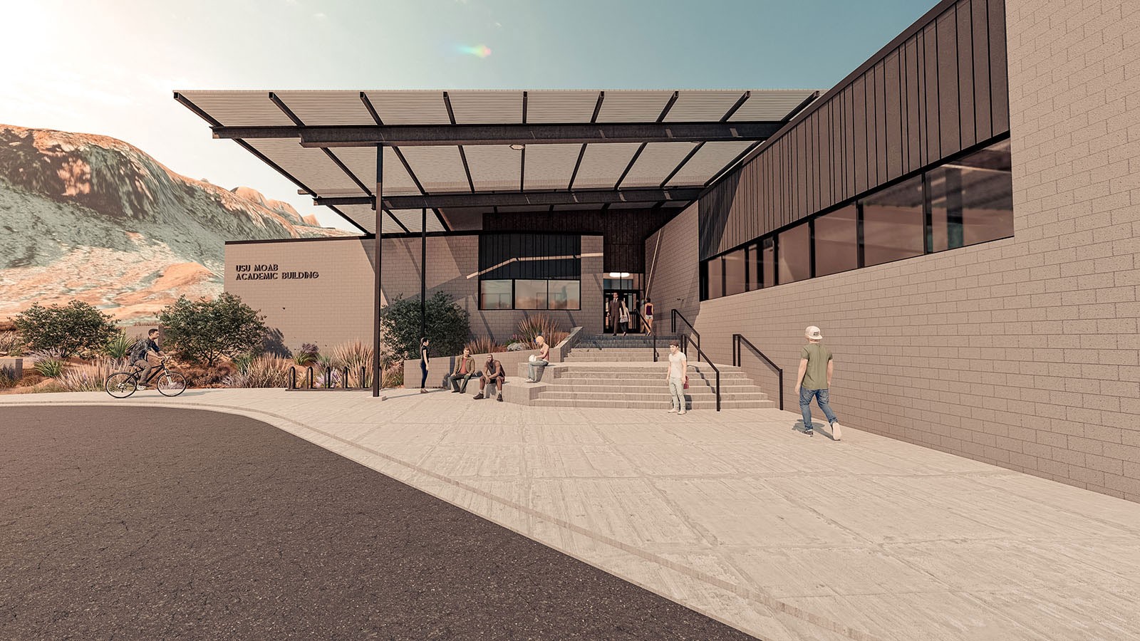 A modern building with a large awning and steps leading to the entrance, surrounded by people and a mountain view.